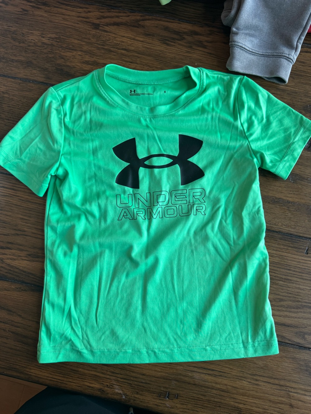Under Armour Kids Short Sleeve Tee in Neon Green with Black Logo